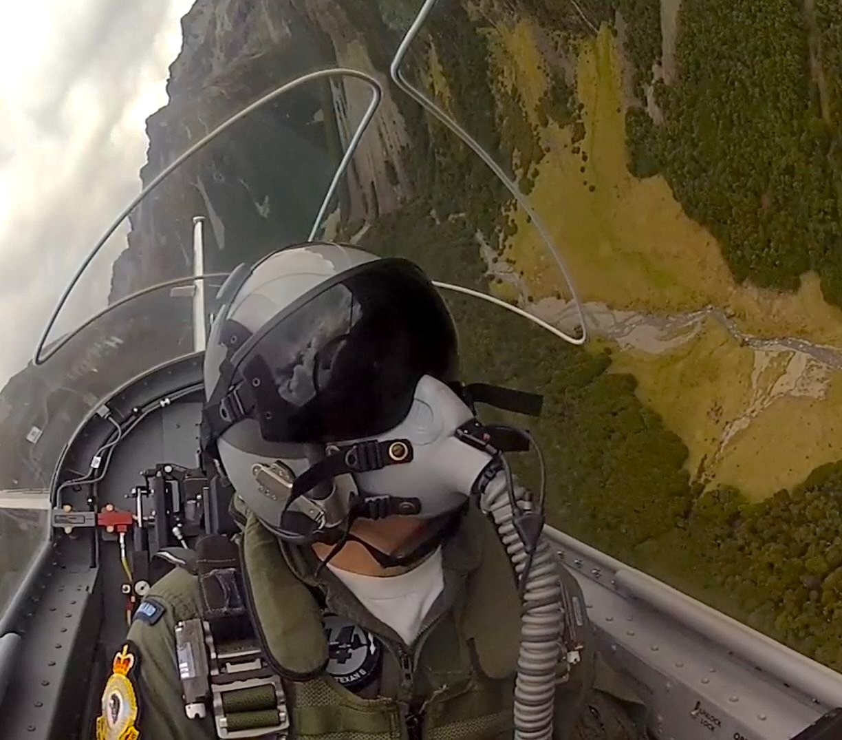 RNZAF T-6 Texan II flying low over a New Zealand valley